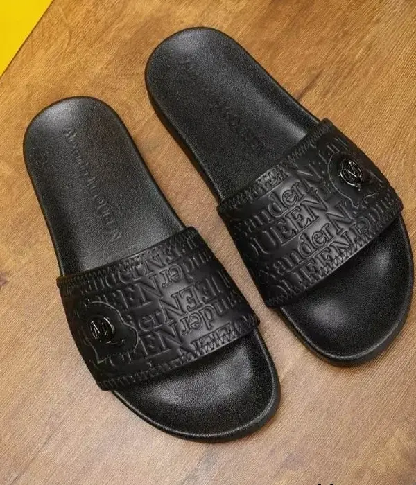 Alexander McQueen Men's Embossed Logo Pattern Sliders With Silver Tone M Emblem Centerpiece