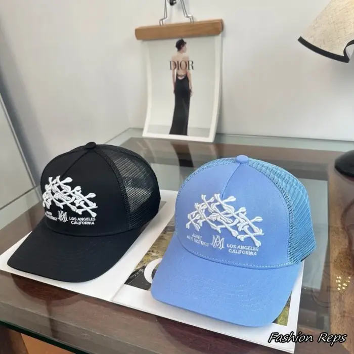 AMIRI Bone Monogram Arts District Trucker Cap In 2 Colors