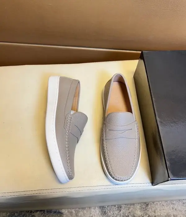 Bottega Veneta Pebble Grain Slip On Loafers With Classic Penny Strap Detail