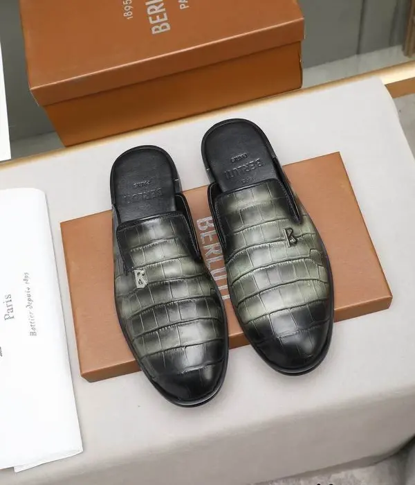 Berluti Crocodile Embossed Mules With Prominent Metallic B Logo Hardware