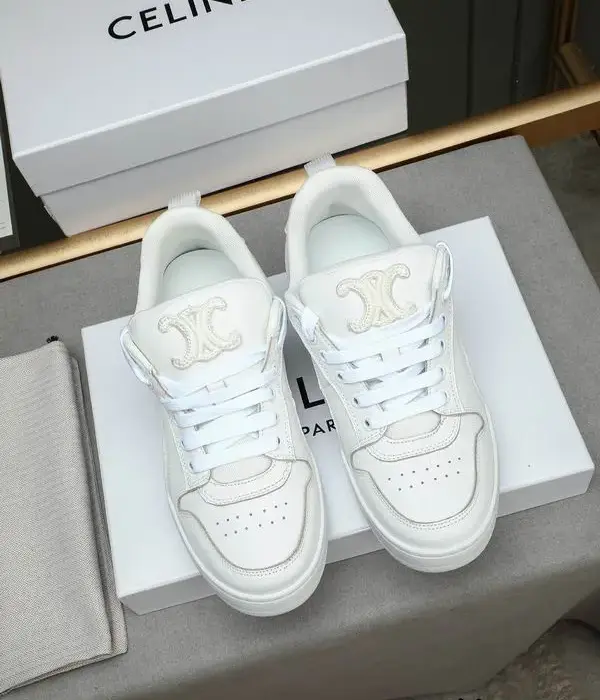 Celine Low Top Trainers With Brand's Logo Embossed Along The Side In White