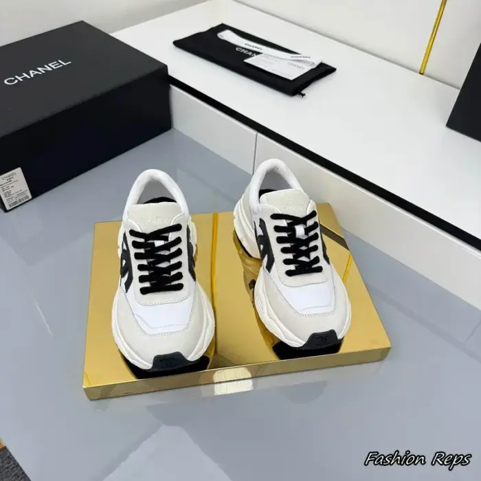 Chanel Chunky White Sneakers With Prominent Black Interlocking CC Logo