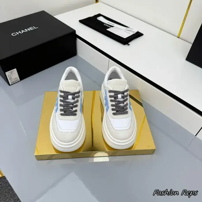 Chanel Low Top Sneakers With Light Blue Side Accents & Grey Laces