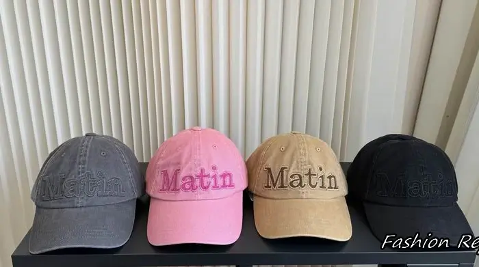 Matin Kim "Matin" Raised Serif Wordmark Embroidered Washed Baseball Cap in Multiple Colors