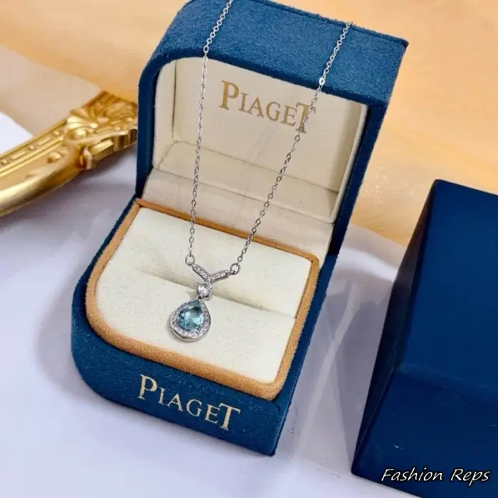 Piaget Pear Cut Aquamarine Chevron Halo Pendant Necklace